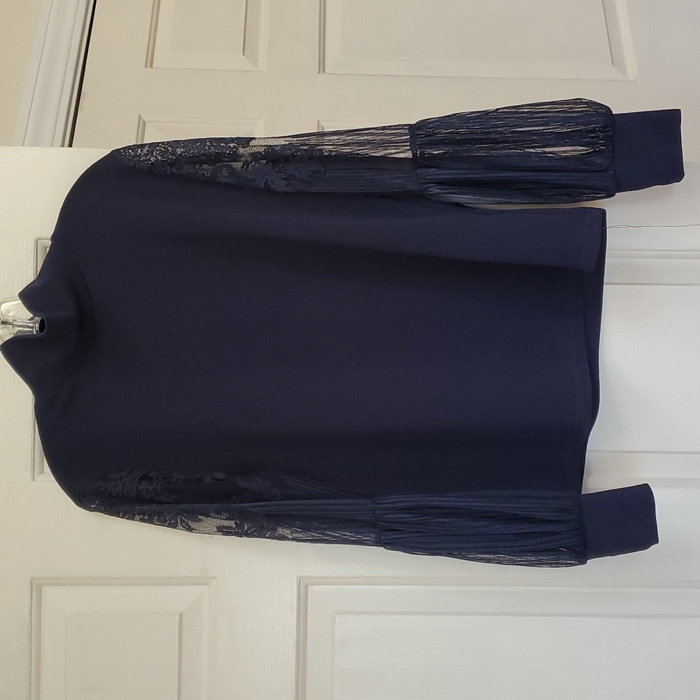 Mock neck blouse.